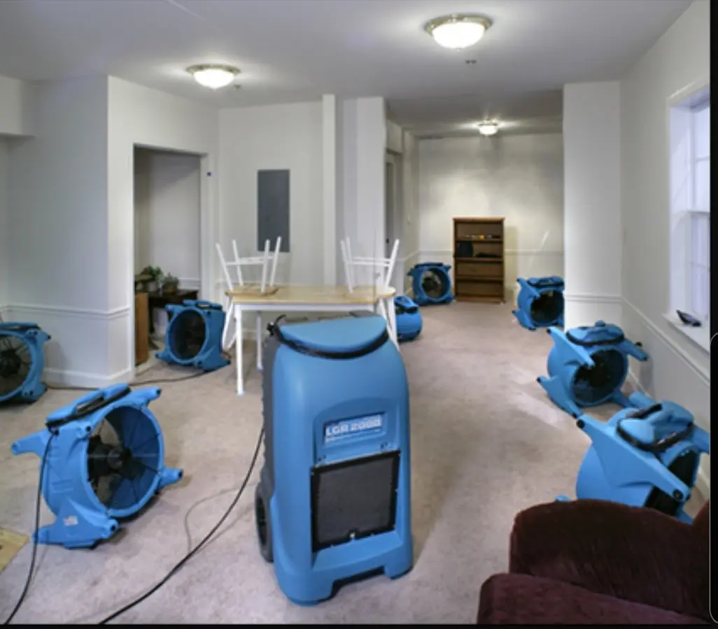Air movers and dehumidifier setup for Water Damage Restoration in Howell